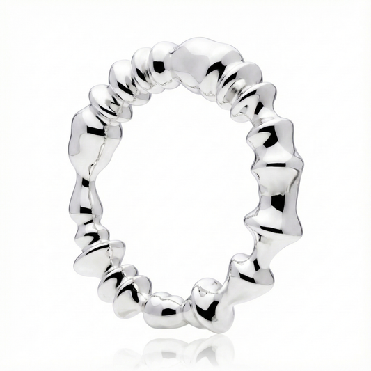 Anillo de plata 925 con ondas irregulares en angulo parado